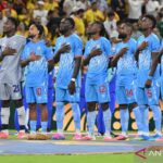Pelatih kebanggaan Kongo itu menorehkan sejarah usai lolos ke babak 32 besar Piala Dunia
