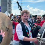 Alat musik Skotlandia mengiringi nyanyian suporter timnas Maroko di Boston